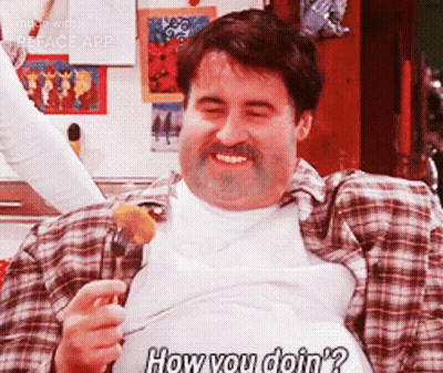 A Man In A Plaid Shirt Is Eating A Fried Potato With A Fork And Says How You Doin ' ? GIF