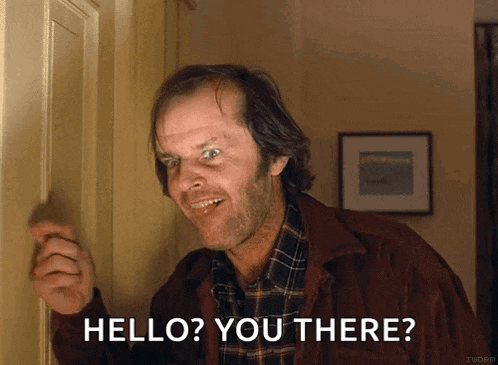 A Man In A Plaid Shirt Is Knocking On A Door And Says " Hello You There " GIF