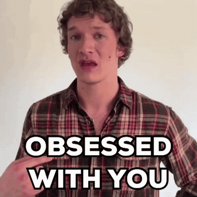A Man In A Plaid Shirt Is Obsessed With You . GIF