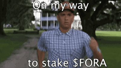 A Man In A Plaid Shirt Is Running In A Park With The Words On My Way To Stake $ Fora Written Below Him GIF