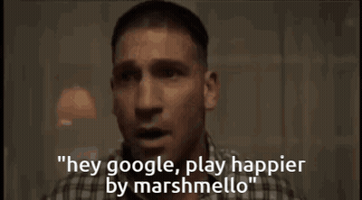 A Man In A Plaid Shirt Is Saying " Hey Google Play Happier By Marshmellow " GIF