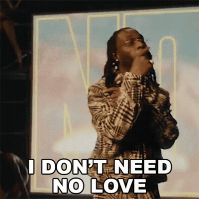 A Man In A Plaid Shirt Is Singing Into A Microphone And Says I Don 'T Need No Love GIF