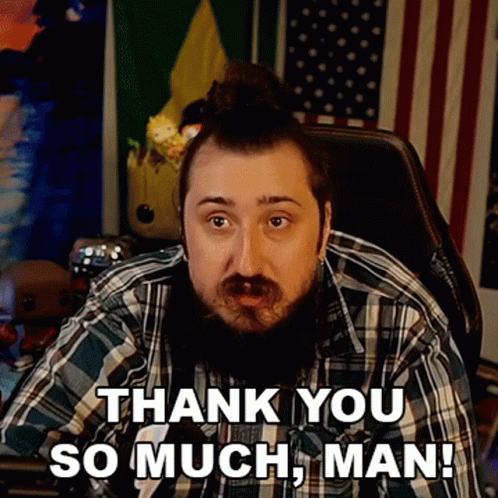 A Man In A Plaid Shirt Is Sitting In A Chair And Saying Thank You So Much Man GIF
