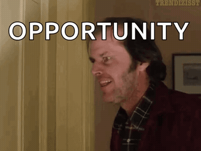 A Man In A Plaid Shirt Is Standing In Front Of A Door And Says Opportunity GIF