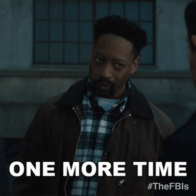 A Man In A Plaid Shirt Is Standing Next To A Sign That Says " One More Time " GIF