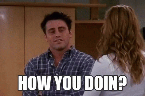 A Man In A Plaid Shirt Is Talking To A Woman In A White Shirt And Asking Her How You Doin . GIF
