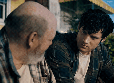 A Man In A Plaid Shirt Is Talking To An Older Man With The Word Kepler Visible In The Corner GIF