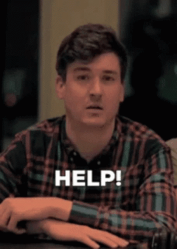 A Man In A Plaid Shirt Says Help GIF