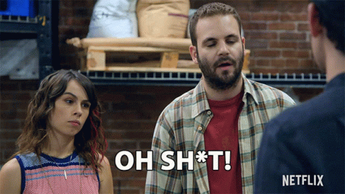 Man In Plaid Shirt Says Oh Sh T Next To Woman GIF