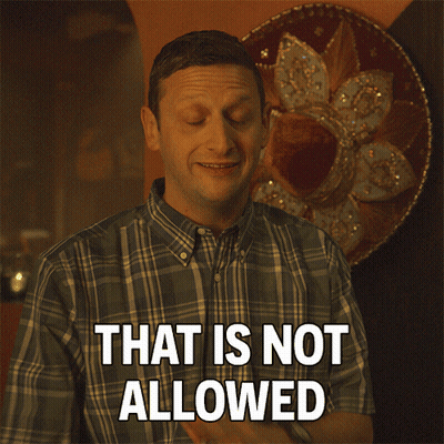 A Man In A Plaid Shirt Says That Is Not Allowed In White Letters GIF