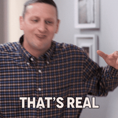 A Man In A Plaid Shirt Says " That 'S Real " While Pointing GIF