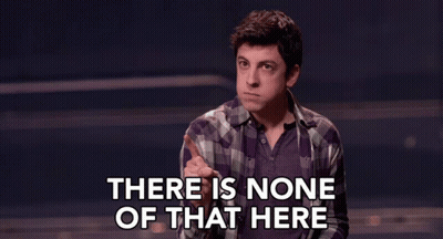 A Man In A Plaid Shirt Says There Is None Of That Here In A Dark Room . GIF