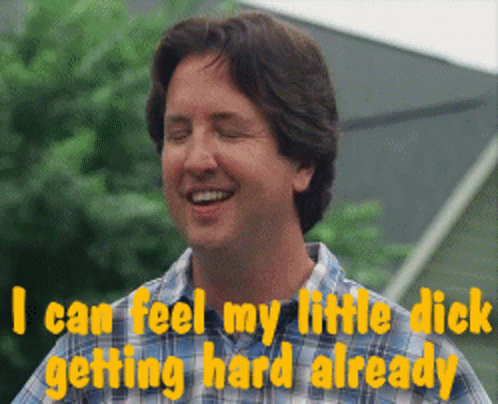 A Man In A Plaid Shirt Smiles And Says " I Can Feel My Little Dick Getting Hard Already " GIF