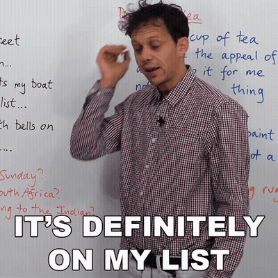 A Man In A Plaid Shirt Stands In Front Of A Whiteboard That Says It 'S Definitely On My List GIF