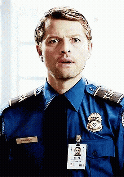 A Man In A Police Uniform Has A Name Tag That Says Franklin On It GIF
