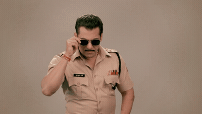 A Man In A Police Uniform Has The Name Salman Written On His Pocket GIF
