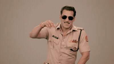 A Man In A Police Uniform Has The Word Lol Written On His Shirt GIF