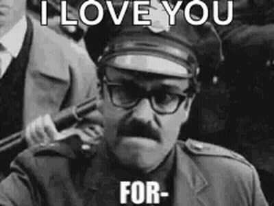 A Man In A Police Uniform Is Holding A Gun And Says I Love You For GIF