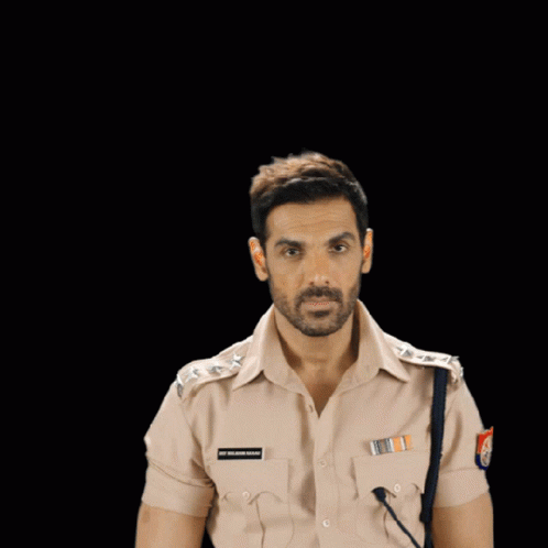A Man In A Police Uniform Salutes With A Name Tag That Says S.p. Vijayan Ahmad GIF