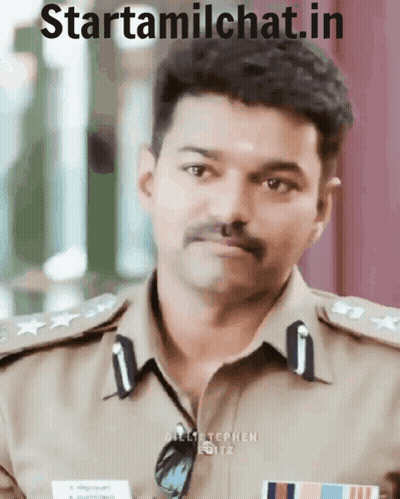 A Man In A Police Uniform With The Words Starttamilchat.in On The Top GIF