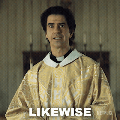 A Man In A Priest 'S Robe Is Standing In Front Of A Sign That Says Likewise Netflix GIF