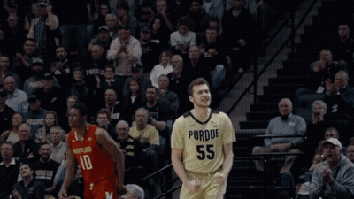 A Man In A Purdue Jersey Celebrates A Win GIF