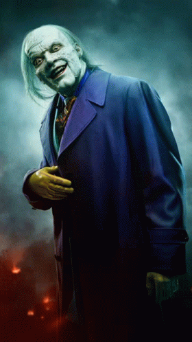 A Man In A Purple Coat And Yellow Gloves GIF