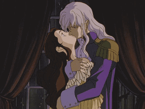 Man In Purple Coat Hugging Woman GIF