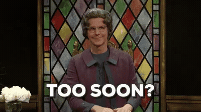 A Man In A Purple Coat Is Sitting In Front Of A Stained Glass Window And Says Too Soon . GIF