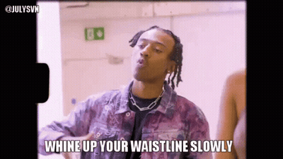 A Man In A Purple Jacket Is Whine Up Your Waistline Slowly In A Video . GIF