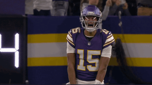 A Man In A Purple Jersey With The Number 15 On It GIF