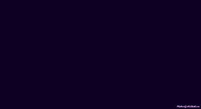 A Man In A Purple Shirt And Tie Has A Tattoo On His Wrist . GIF