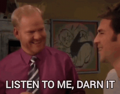 A Man In A Purple Shirt And Tie Is Talking To Another Man Who Says Listen To Me Darn It GIF
