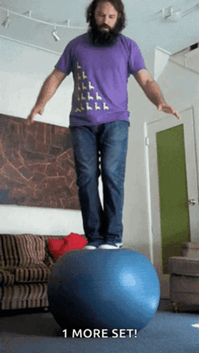 A Man In A Purple Shirt Is Balancing On A Blue Ball With The Words " 1 More Set " Below Him GIF