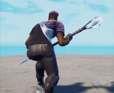 A Man In A Purple Shirt Is Holding A Sword GIF