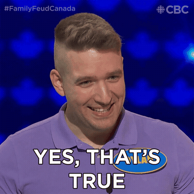 A Man In A Purple Shirt Is Smiling And Saying Yes That 'S True GIF