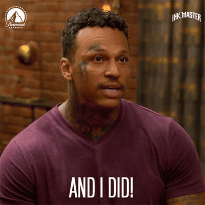 A Man In A Purple Shirt With The Words And I Did On His Shirt GIF