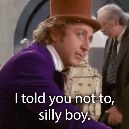 A Man In A Purple Suit Says I Told You Not To Silly Boy GIF