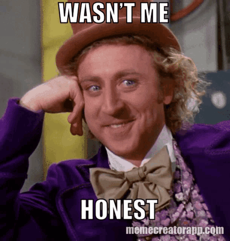 A Man In A Purple Suit With A Bow Tie Has A Meme On His Face That Says Wasn 'T Me Honest GIF
