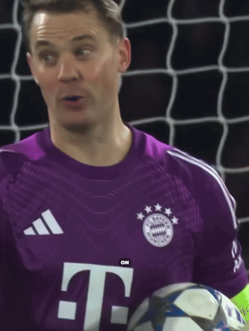 A Man In A Purple T-Mobile Jersey Is Holding A Soccer Ball GIF