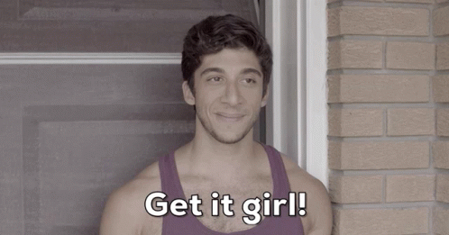 A Man In A Purple Tank Top With The Words Get It Girl On His Chest GIF
