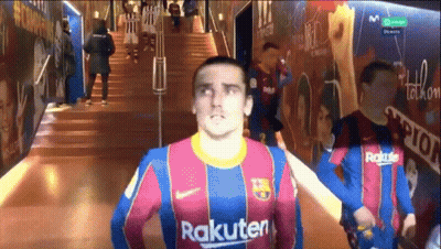 A Man In A Rakuten Jersey Is Standing In A Hallway GIF