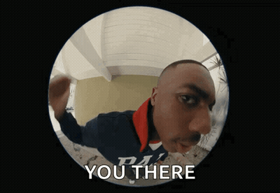 A Man In A Ralph Lauren Jacket Says " You There " In A Fisheye Lens GIF