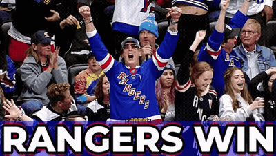 A Man In A Rangers Jersey Stands In A Crowd GIF