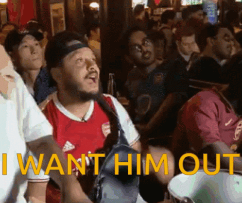 A Man In A Red Adidas Shirt Says " I Want Him Out " In Front Of A Crowd GIF