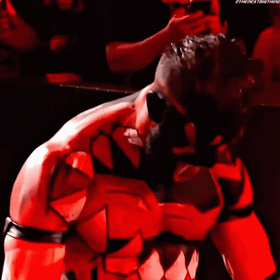 A Man In A Red And Black Costume With The Word Ethe Next Thing On The Bottom GIF