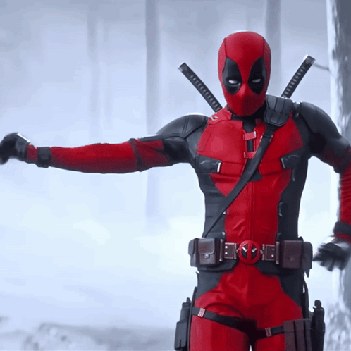 A Man In A Red And Black Deadpool Costume GIF