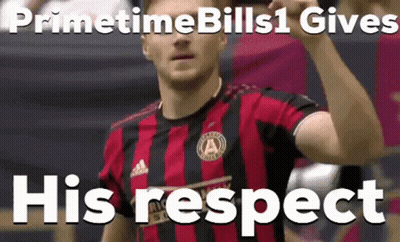 A Man In A Red And Black Striped Shirt With The Words Primetime Bills 1 Gives His Respect Behind Him GIF