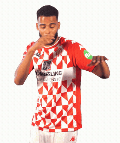 A Man In A Red And White Kommerling Shirt Is Dancing GIF