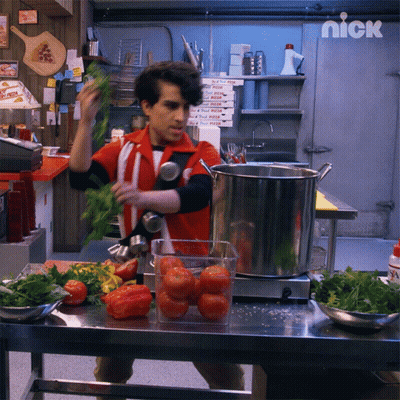 A Man In A Red And White Uniform Is Preparing Food In A Kitchen With A Sign That Says Nick On It GIF